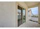 Sliding glass patio door showing a view of other homes in the community at 10512 Mann St, Las Vegas, NV 89141