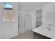 Modern bathroom featuring a glass shower and double sink vanity with a white countertop at 11407 Ethereal Landing Ave, Las Vegas, NV 89138