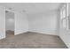 Carpeted bedroom with two windows showing exterior view with ample light at 11407 Ethereal Landing Ave, Las Vegas, NV 89138