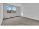 Bright, spacious bedroom with carpeted floor and natural light at 11407 Ethereal Landing Ave, Las Vegas, NV 89138