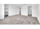 Spacious bedroom with plush carpeting and ample natural light, perfect for relaxation at 11407 Ethereal Landing Ave, Las Vegas, NV 89138