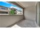 Paver-stone patio offers a cozy outdoor space with a view of neighboring homes and blue sky at 11407 Ethereal Landing Ave, Las Vegas, NV 89138