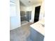 Bathroom featuring tiled floors, dual sink vanity, and glass enclosed shower at 11423 Ethereal Landing Ave, Las Vegas, NV 89138