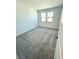 Bedroom with carpet flooring and natural light from windows at 11423 Ethereal Landing Ave, Las Vegas, NV 89138