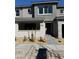 Charming townhome featuring a low maintenance desert landscaped front yard and a covered porch at 11423 Ethereal Landing Ave, Las Vegas, NV 89138
