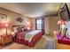 Inviting bedroom boasts a comfortable king-sized bed and ample natural light at 1150 N Buffalo Dr # 1022, Las Vegas, NV 89128