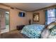 Comfortable bedroom offering a TV, and stylish décor, complemented by natural light at 1150 N Buffalo Dr # 1022, Las Vegas, NV 89128