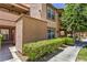 Attractive condo building with manicured landscaping and walkways at 1150 N Buffalo Dr # 1022, Las Vegas, NV 89128