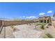 Large backyard with patio, artificial turf, desert landscaping, and mountain views at 12536 Blissful Sky St, Las Vegas, NV 89138