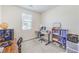 This bedroom is set up as a modern office space at 12536 Blissful Sky St, Las Vegas, NV 89138