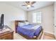 Cozy bedroom includes hardwood floors, closet, and a bed, designed for relaxation and rest at 12536 Blissful Sky St, Las Vegas, NV 89138