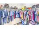 Spacious walk-in closet with ample hanging space, shelves, and an organized layout for efficient storage at 12536 Blissful Sky St, Las Vegas, NV 89138