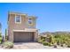 Charming two-story home with a two-car garage and mountain views at 12536 Blissful Sky St, Las Vegas, NV 89138