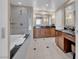 Bathroom featuring a soaking tub, glass shower, and wooden vanity with sinks at 135 E Harmon Ave # 1102, Las Vegas, NV 89109