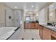 Bathroom showcasing a soaking tub, glass shower, and dual sink vanity at 135 E Harmon Ave # 1102, Las Vegas, NV 89109