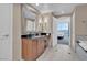 Bathroom showcasing modern fixtures, sleek vanity, and bedroom views at 135 E Harmon Ave # 1102, Las Vegas, NV 89109