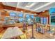 Charming cafe with various food displays, tables, and chairs at 135 E Harmon Ave # 1102, Las Vegas, NV 89109