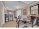 Contemporary dining space featuring a round table, modern decor, and convenient kitchen access at 135 E Harmon Ave # 1102, Las Vegas, NV 89109