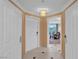 Bright foyer boasts neutral tones with a tile floor and leads to a living area with a view at 135 E Harmon Ave # 1102, Las Vegas, NV 89109