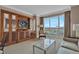 Comfortable living space features custom built-ins, floor to ceiling windows and refined decor at 135 E Harmon Ave # 1102, Las Vegas, NV 89109