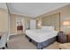 A bright main bedroom with a large window and a work desk at 135 E Harmon Ave # 1102, Las Vegas, NV 89109