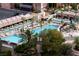 Beautiful outdoor pool area with lounge chairs, palm trees, and a relaxing atmosphere at 135 E Harmon Ave # 1102, Las Vegas, NV 89109
