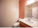 Bathroom featuring a single sink, a vanity, and a toilet at 1405 Gilbert Creek Ave, North Las Vegas, NV 89031