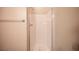 Bathroom featuring a shower with glass doors and white tile at 1405 Gilbert Creek Ave, North Las Vegas, NV 89031