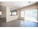 Open dining area with tile flooring, natural light, and a view of the backyard at 1405 Gilbert Creek Ave, North Las Vegas, NV 89031