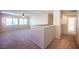 Loft area with three windows and carpeted flooring at 1405 Gilbert Creek Ave, North Las Vegas, NV 89031