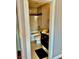 Updated bathroom featuring a tiled shower and vanity with dark wood cabinets at 1915 Hazeltine Ct, Henderson, NV 89074