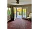 Bedroom with balcony access and shutters at 1915 Hazeltine Ct, Henderson, NV 89074