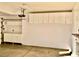 Well-lit garage featuring ample storage cabinets and functional space at 1915 Hazeltine Ct, Henderson, NV 89074