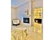 Main bedroom with a fireplace and doorway to a bathroom at 1915 Hazeltine Ct, Henderson, NV 89074
