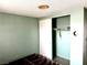 Bedroom featuring a closet with sliding doors and carpet flooring at 212 Hinkle St, Las Vegas, NV 89107