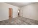 Spacious carpeted bedroom with two entryways and ample natural light at 219 Cordelia Cove Ave # 513, Henderson, NV 89011