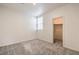 Well-lit carpeted bedroom featuring walk-in closet access at 219 Cordelia Cove Ave # 513, Henderson, NV 89011