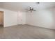 Bright living room featuring tiled floors and a ceiling fan at 219 Cordelia Cove Ave # 513, Henderson, NV 89011