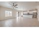 Bright living room with an open layout connected to the modern kitchen at 219 Cordelia Cove Ave # 513, Henderson, NV 89011