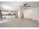 Spacious living room open to the kitchen featuring tiled floors at 219 Cordelia Cove Ave # 513, Henderson, NV 89011