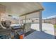 Covered patio features comfortable seating and a view of the pool, perfect for relaxing and outdoor entertaining at 2341 Steinke Ln, Las Vegas, NV 89108