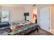 Comfortable bedroom with a mounted television and access to the ensuite bathroom at 2341 Steinke Ln, Las Vegas, NV 89108