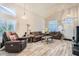 Inviting living room with vaulted ceilings, stylish decor, and wood-look flooring at 2341 Steinke Ln, Las Vegas, NV 89108