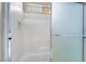 Clean bathroom with a tiled shower and frosted glass doors at 2407 Belt Buckley Dr, Henderson, NV 89002