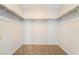 Walk-in closet featuring carpet floors and shelving at 2407 Belt Buckley Dr, Henderson, NV 89002