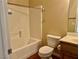Standard bathroom featuring a bath and shower combination with a sink, vanity, and toilet at 2609 Sierra Sage St, Las Vegas, NV 89134