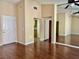 Hardwood floors in an open-concept living room lead to the kitchen and entry way at 2609 Sierra Sage St, Las Vegas, NV 89134
