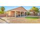 Backyard featuring a covered patio, low maintenance yard, and hot tub at 2720 Mickey Mantle Ct, Las Vegas, NV 89108