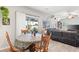 Open dining area adjacent to the living room, filled with natural light at 2720 Mickey Mantle Ct, Las Vegas, NV 89108