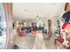 Spacious living room with hardwood floors, a ceiling fan, and a large leather sectional at 2720 Mickey Mantle Ct, Las Vegas, NV 89108